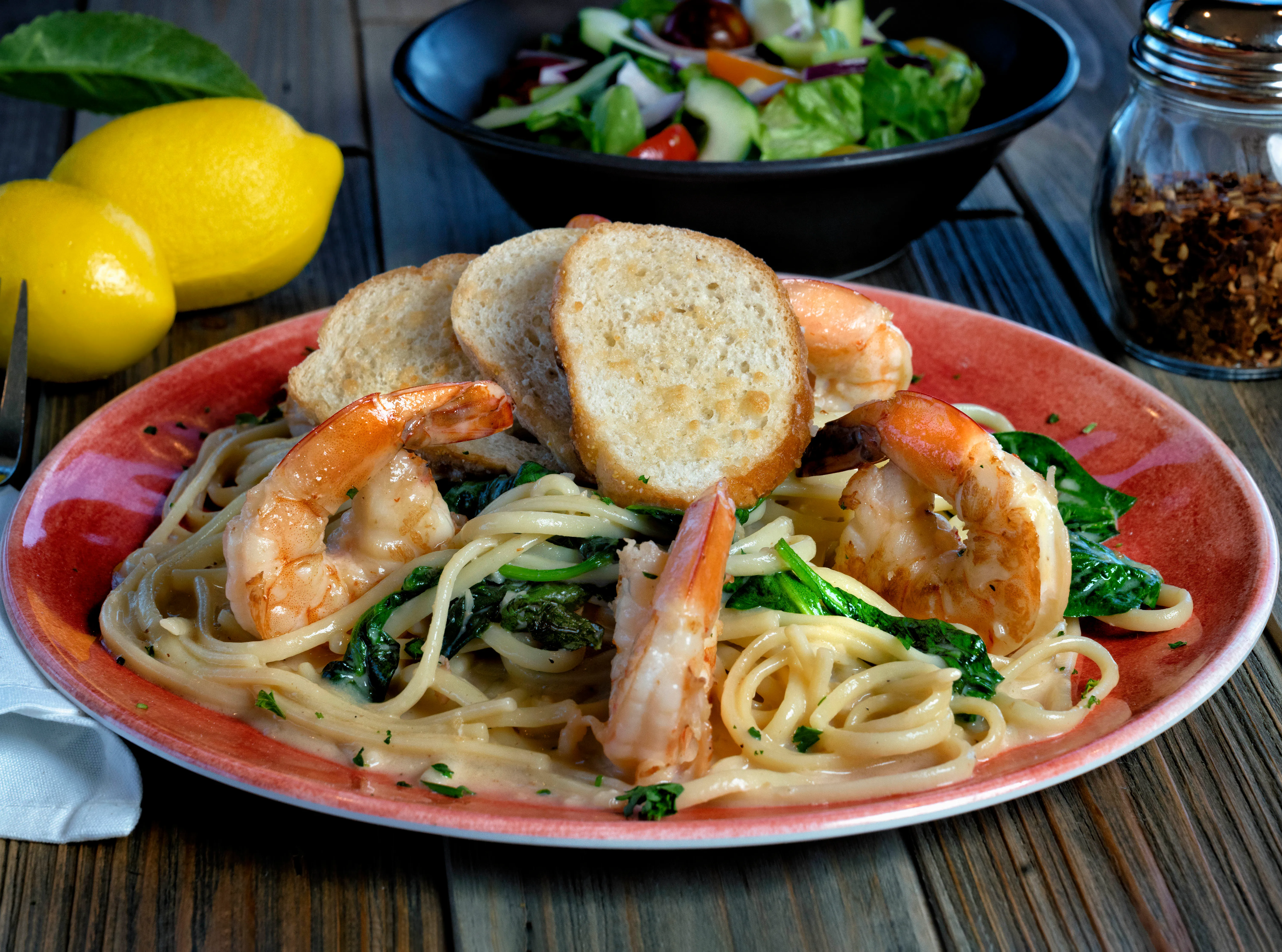 Image of golf ball on tee on grass.